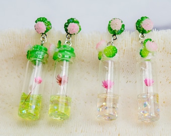 Delicate Glow in the Dark Water Lily Earrings with Iridescent Micro Bubbles, pond earrings, peaceful