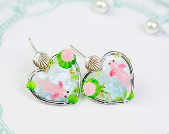 Glow in the dark pink pond axolotl earrings, lapel pins, miniature figures, pendants
