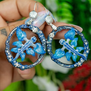 Glaucus atlanticus, glow in the dark nudibranch earrings on bubbly ocean frame, lapel pins, miniature figures, pendants