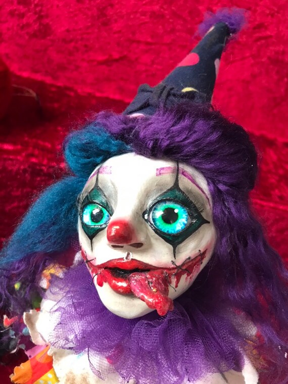 glass clown doll