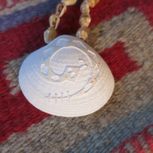 Navajo Shell Necklace, Rattelsnake carved design, Sterling Silver Clasp.