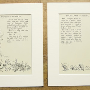 May include: Two framed vintage book pages featuring Winnie-the-Pooh illustrations. The left page shows Pooh with Rabbit and friends, while the right depicts Pooh's friends. Both pages have text.