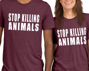 STOP KILLING ANIMALS  Unisex Short sleeve t-shirt