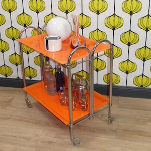 Dinett 70s barwagen bijzettafel opvouwbaar ORANJE kunststof chromen trolley barman space age panton 70s seventies retro