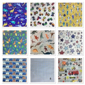 May include: Nine different fabric swatches with various patterns, including dinosaurs, tractors, stars, and trucks. The swatches are numbered 1 through 9.