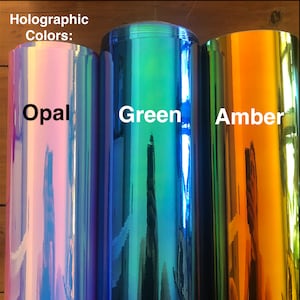 May include: Three rolls of holographic vinyl in opal, green, and amber colors. Holographic Colors: Opal, Green, Amber.