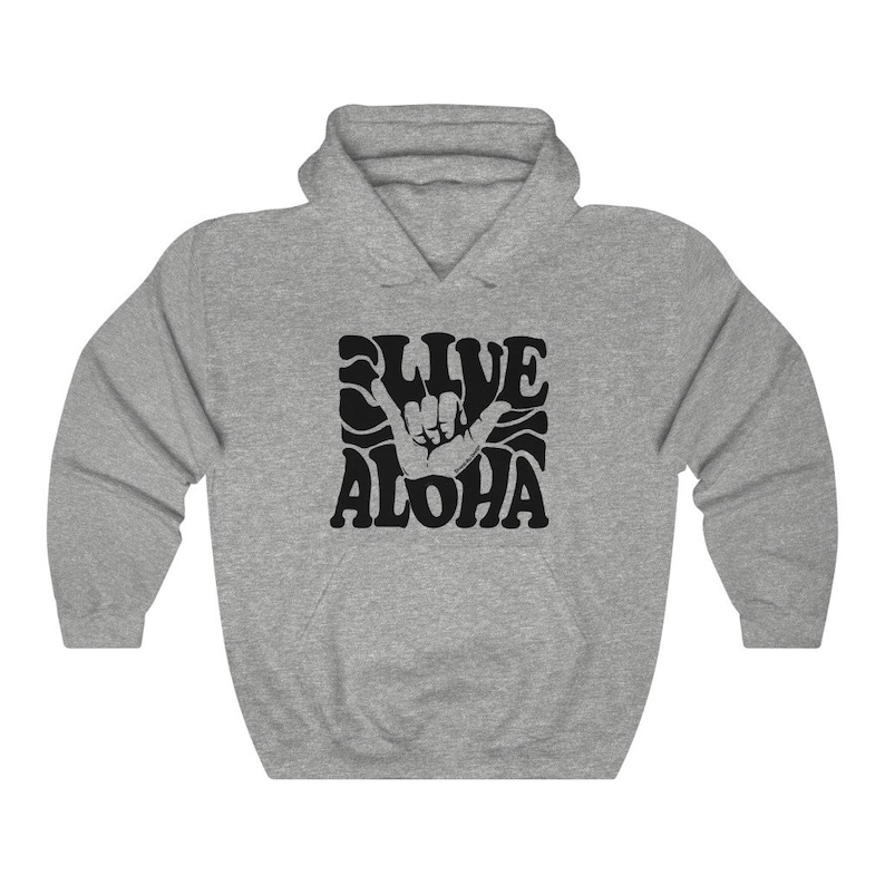 May include: A gray hooded sweatshirt with a black graphic print of a hand making the shaka sign with the text "Live Aloha" in a retro font.