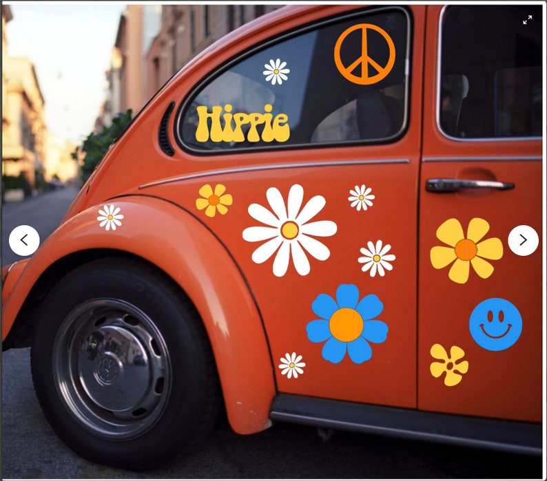May include: A vintage orange Volkswagen Beetle with a peace sign, flowers, and the word "Hippie" in yellow letters on the side.