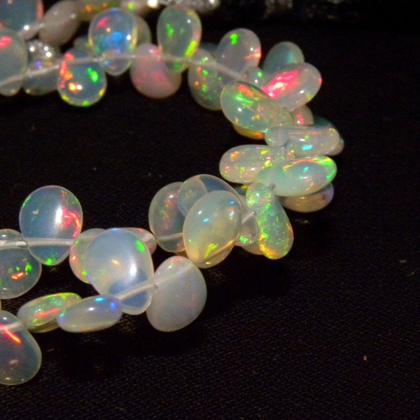 7% off sale Ethiopian Opal Smooth Pear Briolette (Beautiful Play of color) - opal briolette 3 inch strand around 23 briolettes-4x5-4x6M.M.