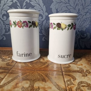 Vintage ceramic flour and sugar canisters by Porcelaine de Paris in the 4 seasons design.