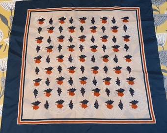 Vintage scarf with green, cream and orange colours and oak leaf design.