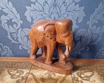 Large vintage elephant figurine, hand made from wood.