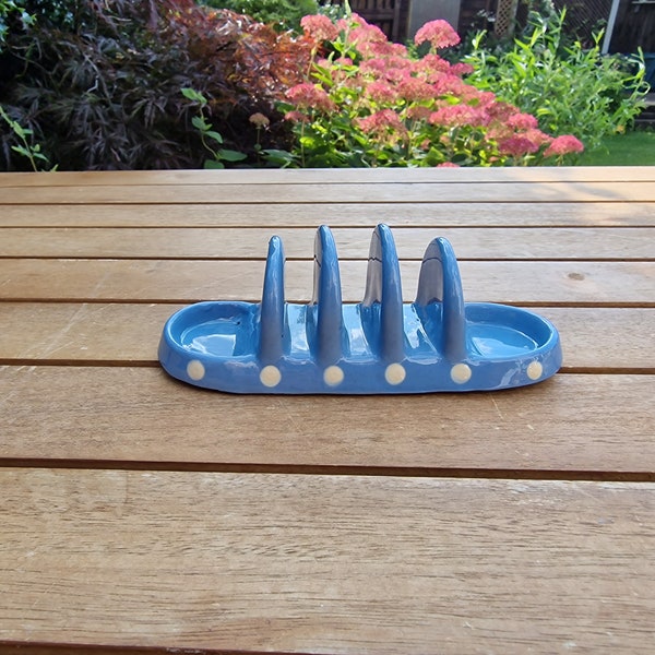 Vintage toast rack, blue with white spots by Babbacombe pottery. Made in Torquay, Devon.