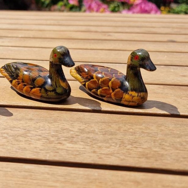 Two miniature geese figurines