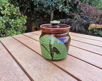 Vintage lidded jam pot in attractive brown and green pattern.