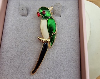 Vintage enamel brooch in the shape of a parrot.