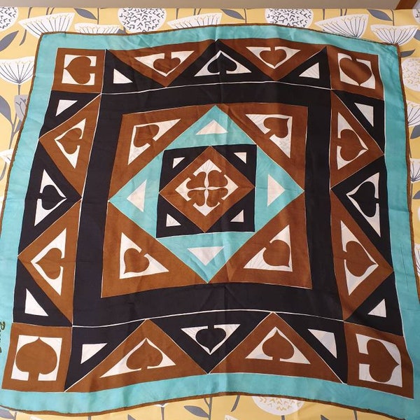 Vintage scarf with brown, turquoise blue and black geometric design by Roger Van S. In a large size.