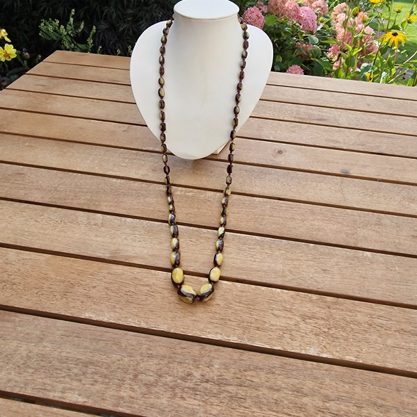Vintage two tone glass beaded necklace, brown and yellow in colour circa 1960's.