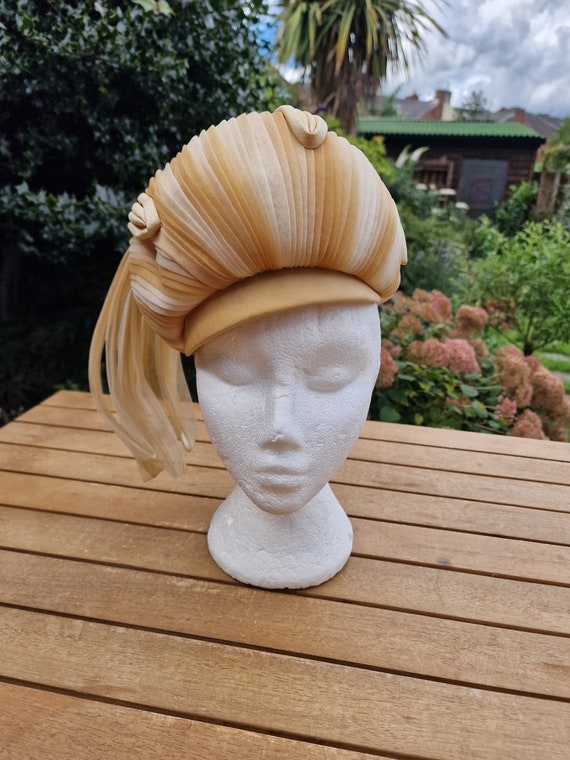 Vintage hat, caramel coloured by Mitzi Lorenz. Siz