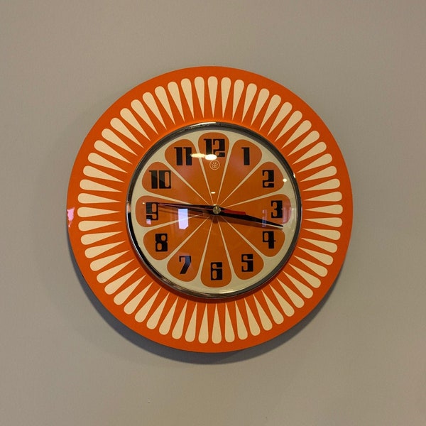 Handmade 1970's style Sunburst Orange Formica Wall Clock in Orange & with a Funky Bright Orange Segment Face from Royale