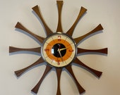 20 inch Hand Made Mid Century style Starburst Cartwheel Clock by Royale - Hand Waxed Mahogany Teakood Rays with a Tangerine Eye Face