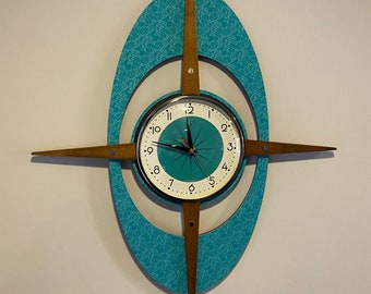 Large 27 inch Mid Century style Starburst Clock by Royale - Turquoise Gambit Face, Medium Teak Wood Rays on Turquoise Naug Laminate