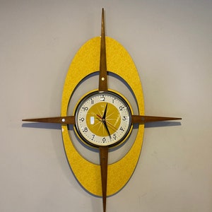 Large 27 inch Mid Century style Royalexe Starburst Clock by Royale.