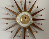 21 inch Hand Made Mid Century style Majestic Starburst Clock by Royale Medium Waxed Teak Rays Burnt Gold 1950s Face Goldtone Frame