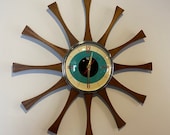 20 inch Hand Made Mid Century style Starburst Cartwheel Clock by Royale - Hand Waxed Mahogany Teakood Rays with a Turquoise Eye Face
