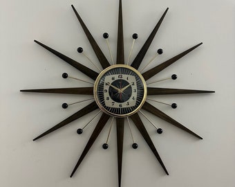 27 inch Hand Made Mid Century style Goldtone Starburst Clock by Royale Dark Walnut Teakwood Rays, Black & Cream Square Ray Face