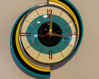 Top Selling Royalexe Spinning Meteor Caravan Wall Clock by Royale in Turquoise - Midcentury Atomic Jetsons Retro in Free Gift Bag.