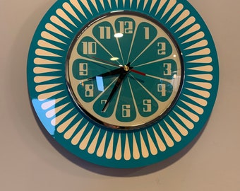 Handmade 1970's style Sunburst Orange Formica Wall Clock in Turquoise & with a Funky Bright Turquoise Segment Face from Royale