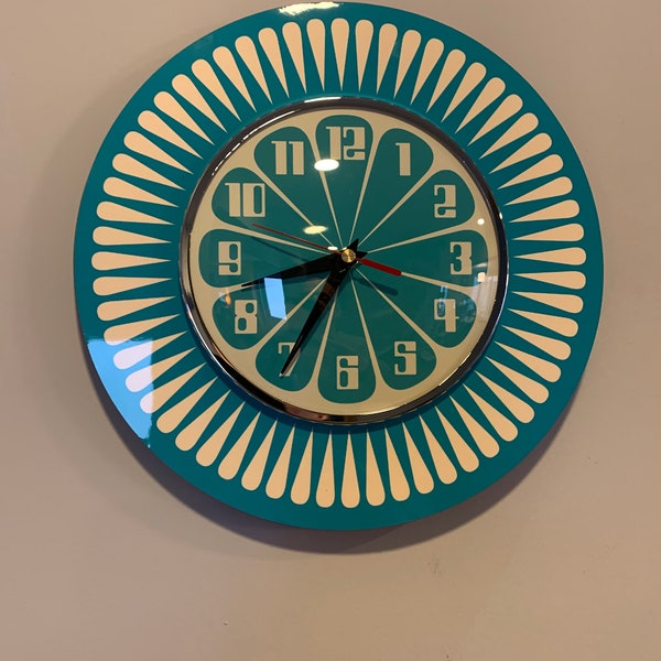 Handmade 1970's style Sunburst Orange Formica Wall Clock in Turquoise & with a Funky Bright Turquoise Segment Face from Royale