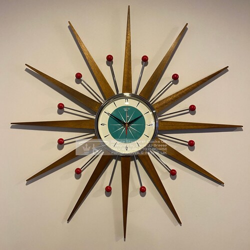 Vintage MidCentury Welby Sunburst Wood Spindle Wall Clock 28