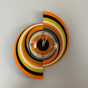 Large Spinning Meteor Eye Wall Clock from Royale - Midcentury Atomic Jetsons Retro style in Orange Cream Yellow & Brown