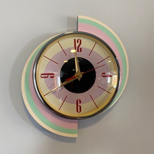 Colour Etched Spinning Meteor Caravan Wall Clock from Royale - Pastel Pink Green Cream Midcentury Atomic Jetsons Retro style.