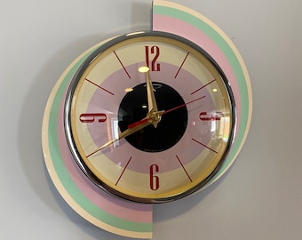 Colour Etched Spinning Meteor Caravan Wall Clock from Royale - Pastel Pink Green Cream Midcentury Atomic Jetsons Retro style.