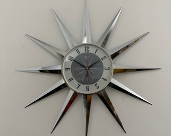 British Made 24 inch Mid Century style Starburst Clock by Royale 12 Nickel Chrome Plated Metal Rays with a 1950's Dove Grey Face