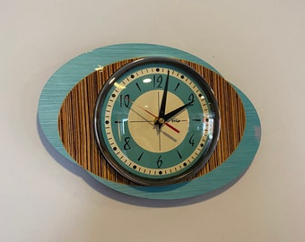 Colour Etched Formica Wall Clock in Aqua Blue Faux Walnut & Zebra Wood from Royale - Midcentury Atomic Jetsons Retro style.