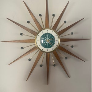 27 inch Hand Made Mid Century style Goldtone Starburst Clock by Royale - Classic Teal Face & Medium Teak Wood Rays