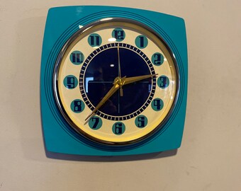 Colour Etched Formica Caravan Wall Clock from Royale Atomic Jetsons Retro style in Turquoise Navy & Cream.