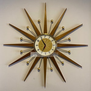 27 inch Hand Made Mid Century style Goldtone Starburst Clock by Royale Medium Teakwood Rays, Burnt Gold & White 1950's Face Design 100