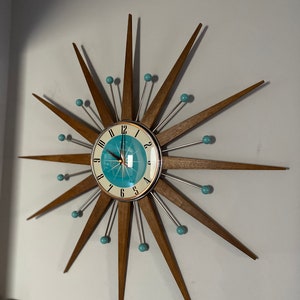 Top Selling Starburst Wall Clock by Royale Mid Century Modern style Chrome Silent Medium Teak Rays Turquoise Face Atomic Balls British Made image 3