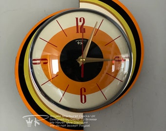 Top Selling Royalexe Spinning Meteor Caravan Wall Clock by Royale in Tangerine Orange - Midcentury Atomic Jetsons Retro  in Free Gift Bag