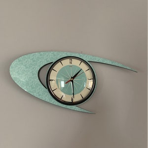 Top Selling Royalexe Laminate Wall Clock By Royale - Midcentury Modern Atomic Boomerang Retro style in Light Turquoise Mint