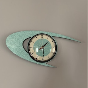 Top Selling Royalexe Laminate Wall Clock by Royale - Midcentury Atomic Boomerang Retro style in Mint Green