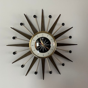 21 inch Hand Made Mid Century style Majestic Starburst Clock by Royale Dark Waxed Teak Rays Black White & Goldtone