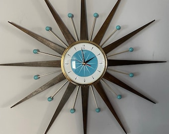 27 inch Hand Made Mid Century style Starburst Clock by Royale with Light Blue 1950's style Face & Dark Waxed Teakwood Rays