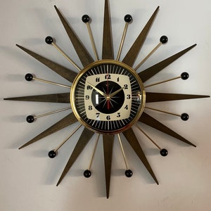 21 inch Hand Made Mid Century style Goldtone Starburst Clock by Royale Dark Walnut Teakwood Rays, Black & Cream Square Ray Face