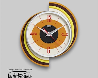 Top Selling Royalexe Spinning Meteor Caravan Wall Clock by Royale in Tangerine and Orange Midcentury Atomic Jetsons Retro